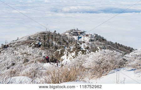 Tourists taking photos of the beautiful scenery around Deogyusan South Korea