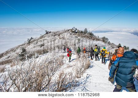 Tourists taking photos of the beautiful scenery around Deogyusan South Korea