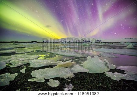 Auroral Over The Glacier Lagoon Jokulsarlon In Iceland.