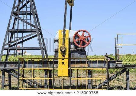 The Pumping Unit As The Oil Pump Installed On A Well. Equipment Of Oil Fields.