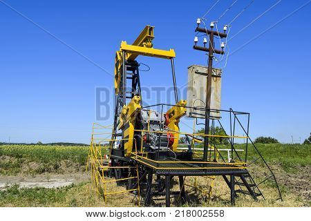 The pumping unit as the oil pump installed on a well. Equipment of oil fields.