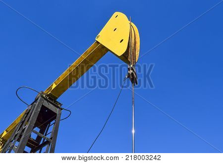 The pumping unit as the oil pump installed on a well. Equipment of oil fields.