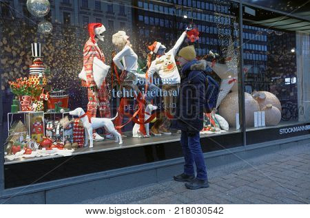 HELSINKI, FINLAND - DECEMBER 9, 2017: Christmas show window of Stockmann department store. This store is the largest department store in the Nordic countries