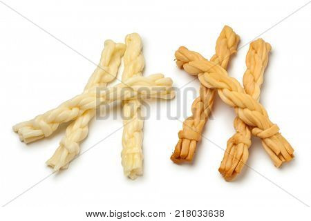 Traditional handmade Slovakian smoked and unsmoked  korbacik string Cheese on white background