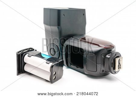 Battery slot in the external flash to the camera with AA rechargeable batteries