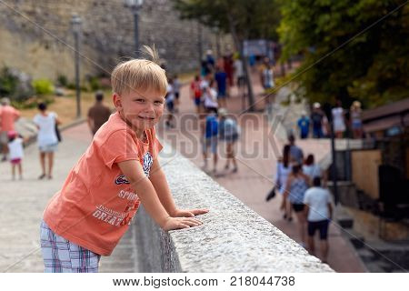 San Marino, San Marino - July 10, 2017: Tourist The Boy Walks Along The Historical Site.