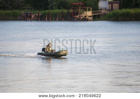 Fishing boat in the middle of the river