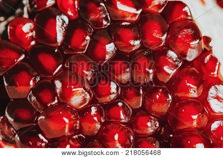 Close up image of pomegrenate on white background