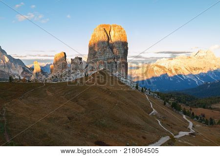 Cinque Torri mountain beautiful autumn colors in Dolomites mountain on the background Tofana peak in valley Cortina D'Ampezzo city at Italy Europe