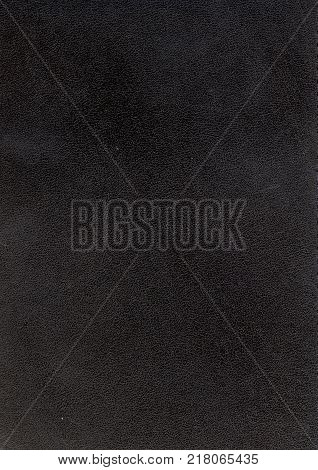 black leather background textured with graining patterns