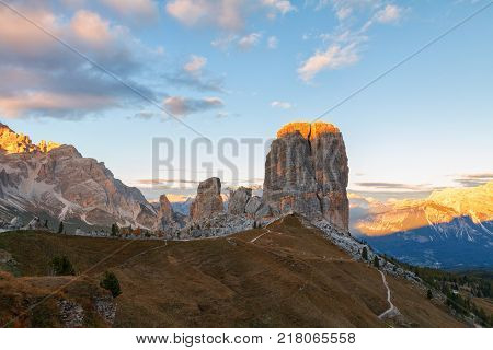 Cinque Torri mountain beautiful autumn colors in Dolomites mountain on the background Tofana peak in valley Cortina D'Ampezzo city at Italy Europe