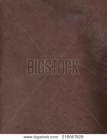 brown leather background textured with graining patterns
