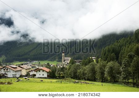 View Landscape Of Apls Mountain And Vernagt-stausee Lake In Vernago Village At Foot Of The Hill Of O