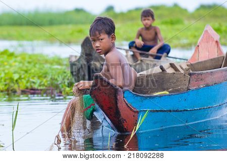 Tonle Sap Cambodia - Oct 18 : Cambodian Children In Tonle Sap Lake Cambodia On October 18 2017. Tonl