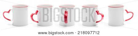 Set of different views of white cup with red handle in heart shape isiolated on a white background