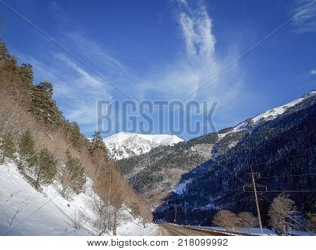 Winter mountain landscape with rocks and snow in Russia