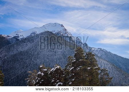 Winter mountain landscape with rocks and snow in Russia