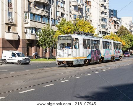 Bucharest Romania October 10 2017 : The city tram goes along the Boulevard Corneliu Coposu in Bucharest city in Romania