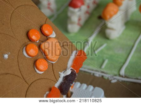 tiger paw on gingerbread roof with marshmallow football players