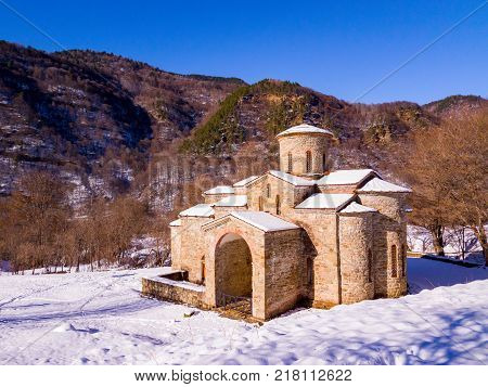 North Caucasus. Lower-Arkhyz settlement. Abandoned orthodox temple. Winter landscape