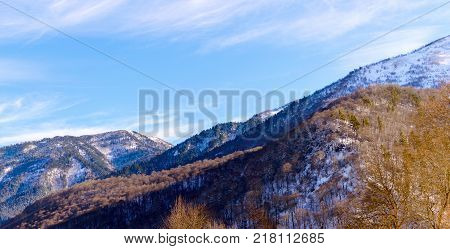 Winter mountain landscape with rocks and snow in Russia
