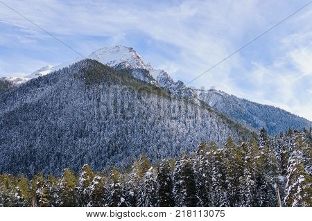 Winter mountain landscape with rocks and snow in Russia