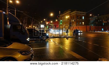Kiev National University in the evening. Crossroads. Vladimirskaya street and Shevchenko boulevard