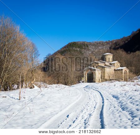 North Caucasus. Lower-Arkhyz settlement. Abandoned orthodox temple. Winter landscape