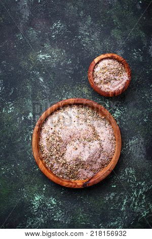 Himalayan salt with dried herbs. Aromatic spices. Selective f ocus