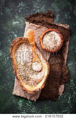 Himalayan salt with dried herbs. Aromatic spices. Selective f ocus