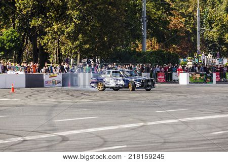 23 september 2017 drift bmv 3 a crowd of unidentified people watching with interest the maneuvers of an experienced driverChisinauMoldova