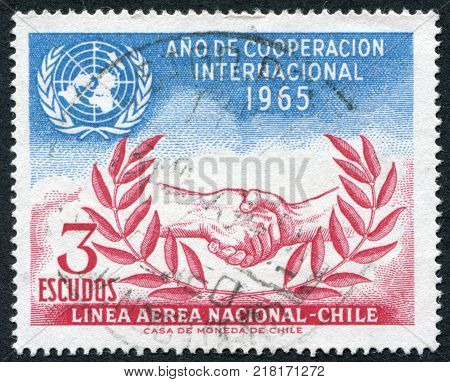 CHILE - CIRCA 1966: Postage stamps printed in Chile shows a symbol of the UN and LAN Airlines circa 1966