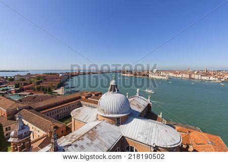 View from the tower of the 16th-century Benedictine San Giorgio Maggiore church on Giudecca Canal Venice Italy. The channel separates the Giudecca island from the Dorsoduro district.
