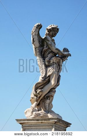 ROME, ITALY - SEPTEMBER 03: Statue of Angel with the Crown of Thorns by Gian Lorenzo Bernini, Ponte Sant Angelo in Rome, Italy  on September 03, 2016.