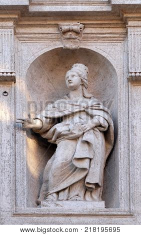 ROME, ITALY - SEPTEMBER 02: Saint Jeanne de Valois statue on the facade of Chiesa di San Luigi dei Francesi - Church of St Louis of the French, Rome, Italy on September 02, 2016.