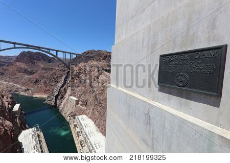 NEVADA, USA - June 30, 2017: Sign at the Hoover Dam. Its located on the street of the Dam in memory of Herbert Clark Hoover,  the 31st President of the United States