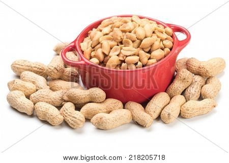 Roasted peanuts with peanut shells isolated on white background