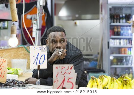 TEL AVIV , ISRAEL - 21 NOVEMBER 2017: Sellers on the old grocery street Nahalat-Benjamin