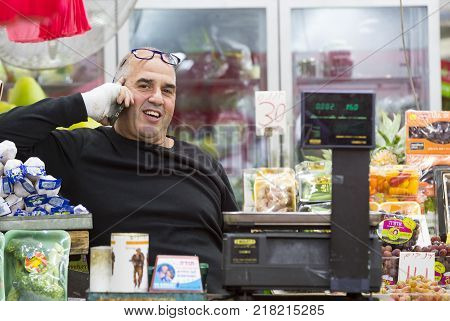 TEL AVIV , ISRAEL - 21 NOVEMBER 2017: Sellers on the old grocery street Nahalat-Benjamin
