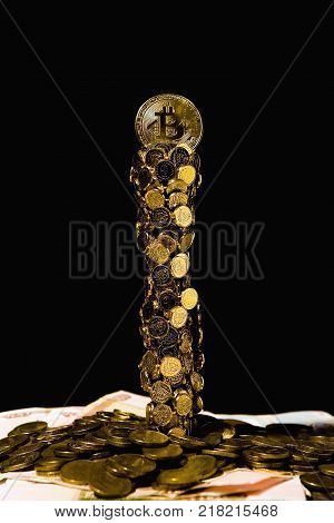 Still life with bitkoyn on a black background. Crypto currency.