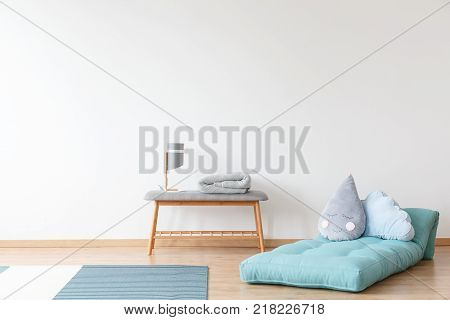 Kid's Room With Blue Mattress