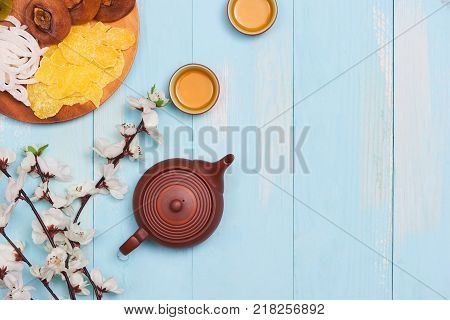 Top View Accessories Chinese New Year Festival Decorations.orange,leaf On Blue Background