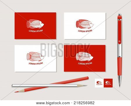 The bright corporate identity with fish and ornaments in ethnic style. Samples of business cards a pen a flash card a pencil. Vector.
