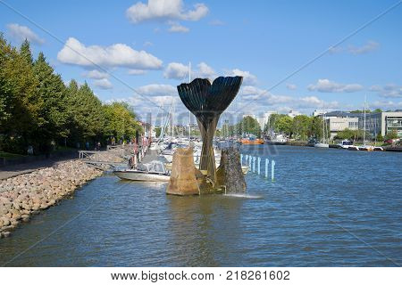 TURKU, FINLAND - AUGUST 27, 2016: View of the Harmony fountain on the Aura river on a sunny August afternoon
