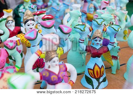 Colorful dolls made of clay handicrafts on display during the Handicraft Fair in Kolkata earlier Calcutta West Bengal India. It is the biggest handicrafts fair in Asia.