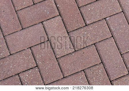 The texture of paving slabs. Pattern of paving slabs on the street