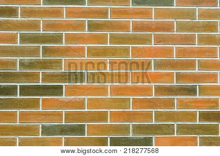 New wall of red brick after construction. Dirty in alabaster.