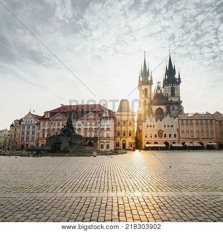 PRAGUE, CZECH REPUBLIC - JUNE 05, 2016: Kostel Panny Marie pred Tynem at the sunrise. Church of the Virgin Mary. Beautiful Old Town Square with the church without people in Romanesque - Gothic style.