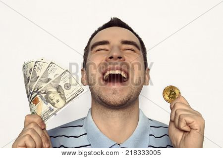 Guy Holding The Coin Bitcoin And Money In Hand.