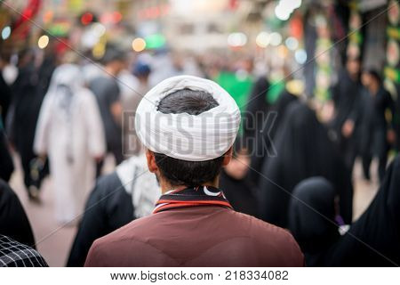 Pilgrims in Karbala walking towards The Holy Shrine of Imam Hussain